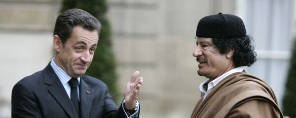 نيكولاي ساركوزي والعقيد معمر القذافي نيكولاي ساركوزي والعقيد معمر القذافي - سبوتنيك عربي