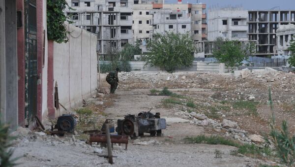 الوضع في سوريا -الجيش السوري في مخيم يرموك للاجئين الفلسطينيين في ضواحي العاصمة دمشق، سوريا - سبوتنيك عربي