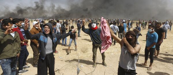 محتجون فلسطينيون في قطاع غزة، 4 مايو/ أيار 2018 - سبوتنيك عربي