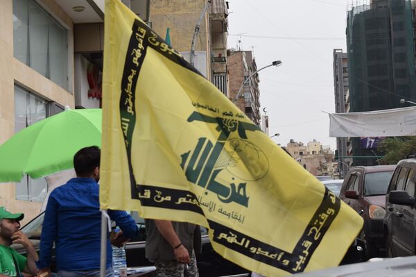 شعار حزب الله من الانتخابات النيابية اللبنانية - سبوتنيك عربي