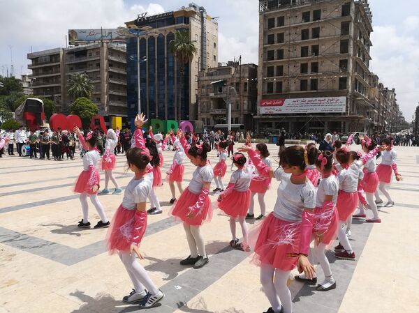 حلب تحتفل بعيد النصر الروسي في ساحتها الرئيسية - سبوتنيك عربي