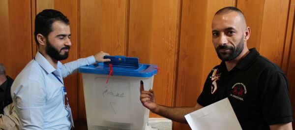 العراقيون في الخارج يدلون بأصواتهم في الانتخابات البرلمانية - سبوتنيك عربي