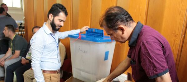 العراقيون في الخارج يدلون بأصواتهم في الانتخابات البرلمانية - سبوتنيك عربي