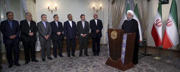 الرئيس الإيراني حسن روحاني خلال خطابه بعد خروج دونالد ترامب من صفقة الاتفاق النووي مع إيران، 8 مايو/ أيار 2018 - سبوتنيك عربي