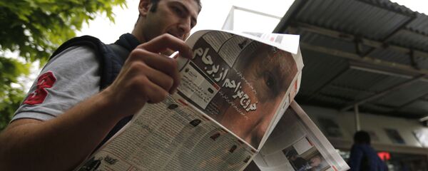 احتجاجات في طهران بعد خروج دونالد ترامب من صفقة الاتفاق النووي مع إيران، 9 مايو/ أيار 2018 - سبوتنيك عربي