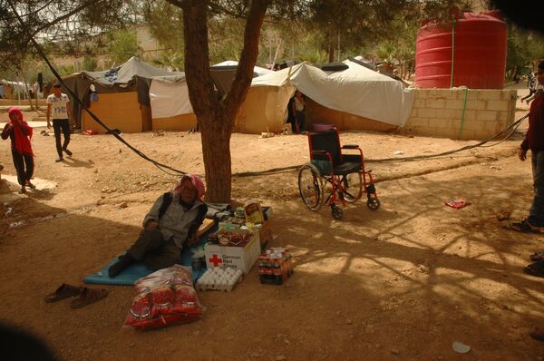 اقتصاد مراكز الإيواء... نازحون يعملون بطرق مختلفة لتأمين المال - سبوتنيك عربي