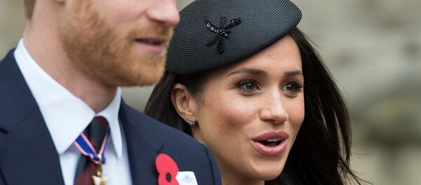 الممثلة الأمريكية ميغان ماركل مع خطيبها نجل ولي عهد بريطانيا الأمير هاري - سبوتنيك عربي