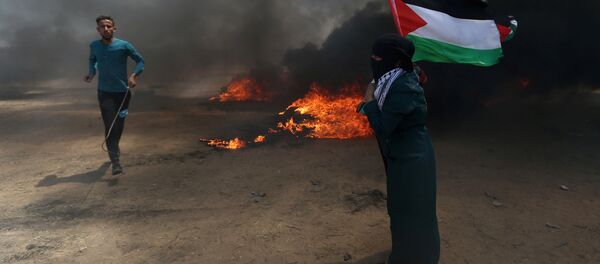  احتجاجات تعم البلاد ضد نقل السفارة الأمريكية إلى القدس، شرق غزة، قطاع غزة، فلسطين 14 مايو/ أيار 2018 - سبوتنيك عربي