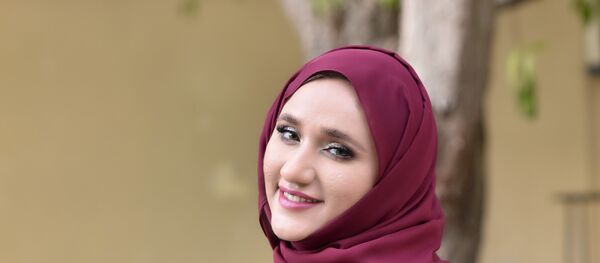 الروائية الإماراتية تهاني الهاشمي - سبوتنيك عربي