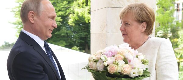 بوتين وميركل بوتين وميركل - سبوتنيك عربي