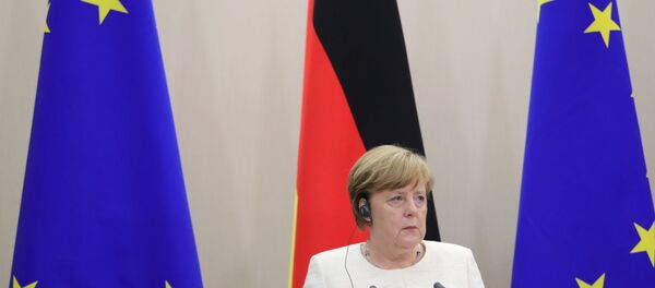 مؤتمر صحفي للرئيس فلاديمير بوتين والمستشارة الألمانية أنجيلا ميركل في سوتشي، 18 مايو/ أيار 2018 - سبوتنيك عربي