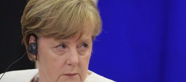 مؤتمر صحفي للرئيس فلاديمير بوتين والمستشارة الألمانية أنجيلا ميركل في سوتشي، 18 مايو/ أيار 2018 - سبوتنيك عربي