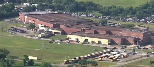 This image taken from video shows the campus of Santa Fe High School, Friday, May 18, 2018, in Santa Fe, Texas - سبوتنيك عربي