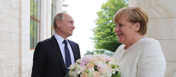 لقاء الرئيس الروسي فلاديمير بوتين والمستشارة الألمانية انجيلا ميركل - سبوتنيك عربي