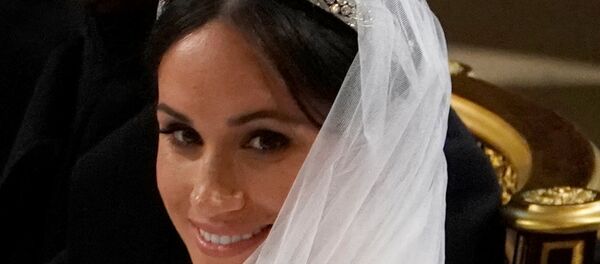 ميغان ماركل في حفل زفافها على نجل ولي عهد بريطانيا الأمير هاري، 19 مايو/أيار 2018 - سبوتنيك عربي