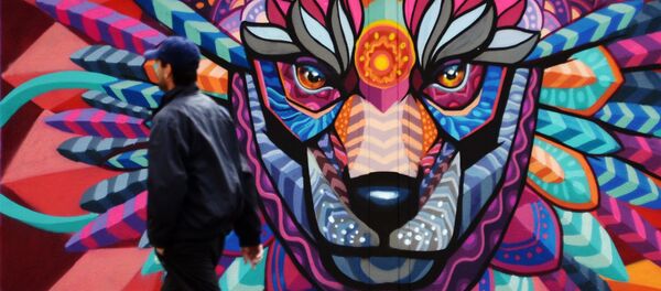 رسم غرافيتي في موسكو بمناسبة بطولة كأس العالم لكرة القدم 2018 - سبوتنيك عربي