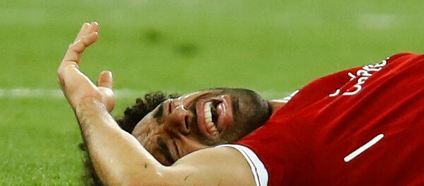 محمد صلاح عقب إصابته في نهائي دوري أبطال أوروبا، 26 مايو/أيار 2018 - سبوتنيك عربي