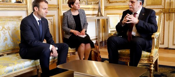 لقاء بين فايز السراح والرئيس الفرنسي إيمانويل ماكرون في باريس - سبوتنيك عربي