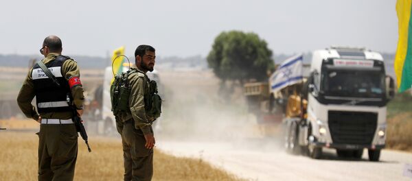 الجيش الإسرائيلي على الحدود مع غزة الجيش الإسرائيلي على الحدود مع غزة - سبوتنيك عربي