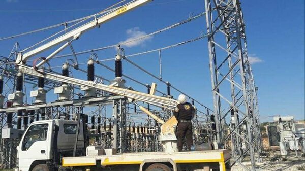 المسلحون الصينيون يسرقون كابلات شبكة الكهرباء بريف إدلب - سبوتنيك عربي
