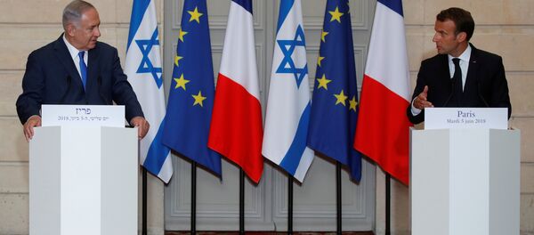 نتنياهو وماكرون خلال مؤتمر صحفي في باريس نتنياهو وماكرون خلال مؤتمر صحفي في باريس - سبوتنيك عربي