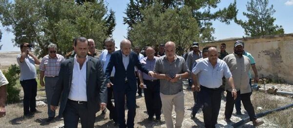 وزير الموارد المائية السوري يتفقد ريفي حمص وحماة بعد تحريرها من الإرهاب - سبوتنيك عربي