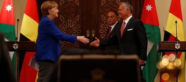 العاهل الأردني الملك عبد الله الثاني والمستشارة الألمانية أنجيلا ميركل - سبوتنيك عربي