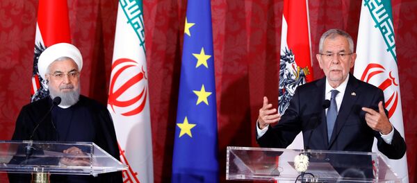 الرئيس النمساوي فان دير بيلين والرئيس الإيراني روحاني يحضران مؤتمرهما الصحفي في العاصمة النمساوية فيينا، 4 يوليو/تموز 2018 - سبوتنيك عربي