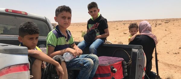 عائلة، فارون من داعش من مدينة صيدا - سبوتنيك عربي