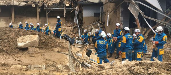 تداعيات الفياضانات في مدينة هيروشيما، اليابان 10 يوليو/ تموز 2018 - سبوتنيك عربي