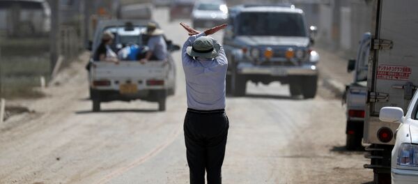 تداعيات الفياضانات في مدينة كوراشيكي التابعة لمحافظة أوكاياما، اليابان 10 يوليو/ تموز 2018 - سبوتنيك عربي