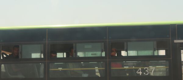 المسلحون من درعا داخل الحافلات قبل توجههم إلى الشمال السوري - سبوتنيك عربي