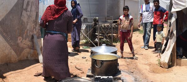 مخيم للنازحين السوريين في منطقة العقيدية في لبنان - سبوتنيك عربي