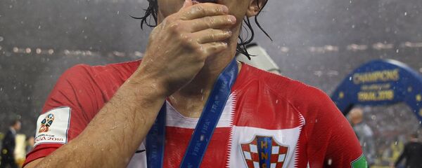 كابتن المنتخب الكرواتي لوكا مودريتش فاز بجائزة أفضل لاعب في بطولة كأس العالم لكرة القدم روسيا - 2018 - سبوتنيك عربي