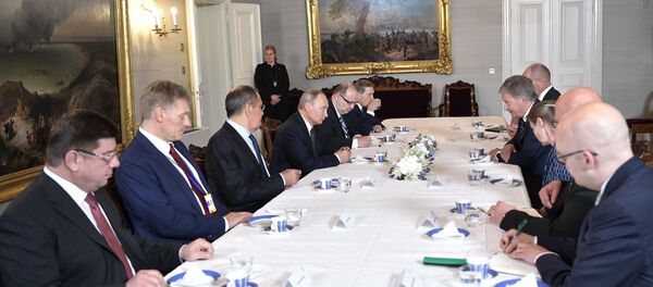 لقاء الرئيسين الروسي فلاديمير بوتين والأمريكي دونالد ترامب في هلسنكي - سبوتنيك عربي