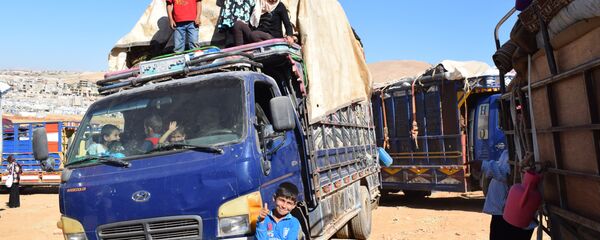 أهالي القلمون الغربي يغادرون عرسال اللبنانية ويعبرون عن سعادتهم في تسهيل إجراءات العودة - سبوتنيك عربي