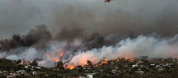 اندلاع الحرائق في شرق أثينا، اليونان 23 يوليو/ تموز 2018 - سبوتنيك عربي