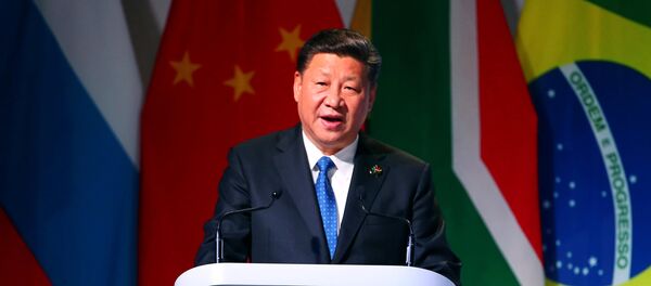 الرئيس الصيني شي جين بينغ في قمة بريكس في جوهانسبرغ، 25 يوليو/تموز 2018 - سبوتنيك عربي