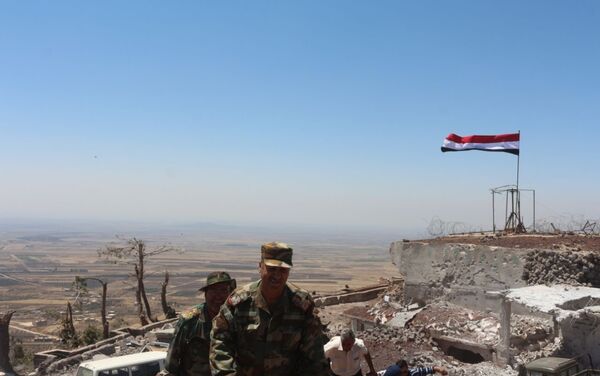 مسلحو نوى بريف درعا يسلمون أسلحتهم الثقيلة ويؤازرون الجيش السوري في مواجهة داعش - سبوتنيك عربي