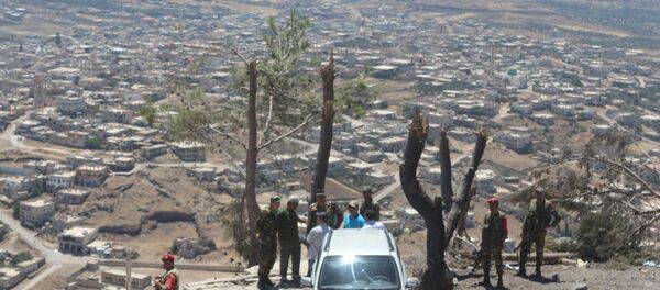 مسلحو نوى بريف درعا يسلمون أسلحتهم الثقيلة ويؤازرون الجيش السوري في مواجهة داعش - سبوتنيك عربي