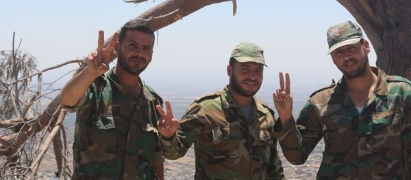 مسلحو نوى بريف درعا يسلمون أسلحتهم الثقيلة ويؤازرون الجيش السوري في مواجهة داعش - سبوتنيك عربي