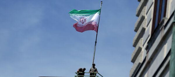 العلم الإيراني فوق المستشارية النمساوية خلال زيارة روحاني - سبوتنيك عربي