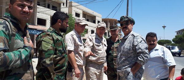 قوات حفظ السلام (أوندوف) تجول (بسلام) ضمن المنطقة العازلة بالجولان تحت حماية الشرطة الروسية والجيش السوري قوات حفظ السلام (أوندوف) تجول (بسلام) ضمن المنطقة العازلة بالجولان تحت حماية الشرطة الروسية والجيش السوري - سبوتنيك عربي