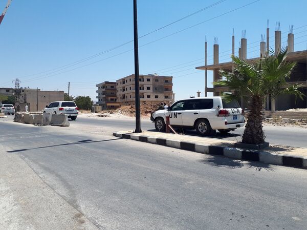 قوات حفظ السلام (أندوف) تجول (بسلام) ضمن المنطقة العازلة بالجولان تحت حماية الشرطة الروسية والجيش السوري - سبوتنيك عربي