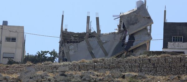 مبنى مهدم في الأردن، بعد العملية الأمنية، السبت 11 أغسطس/آب 2018 مبنى مهدم في الأردن، بعد العملية الأمنية، السبت 11 أغسطس/آب 2018 - سبوتنيك عربي