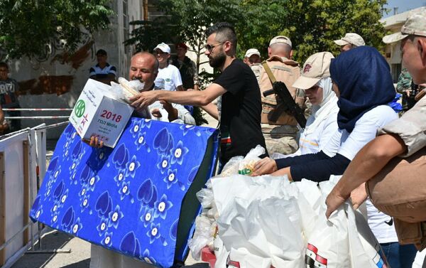 روسيا معكم...مع الحب تزين موائد الفقراء بحلب - سبوتنيك عربي
