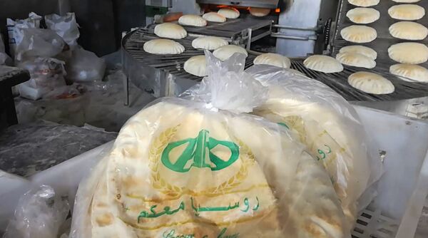 روسيا معكم...مع الحب تزين موائد الفقراء بحلب - سبوتنيك عربي