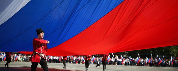 مراسم الاحتفال بيوم علم روسيا الاتحادية في كراسنودار - سبوتنيك عربي