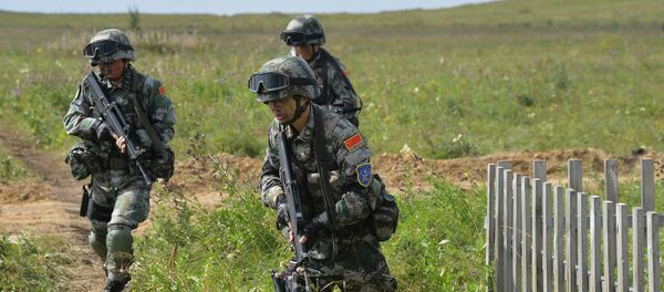 المناورات المشتركة لمنظمة شنغهاي للتعاون مهمة السلام-2018 في حقل للتدريبات في تشيباركول في روسيا - سبوتنيك عربي