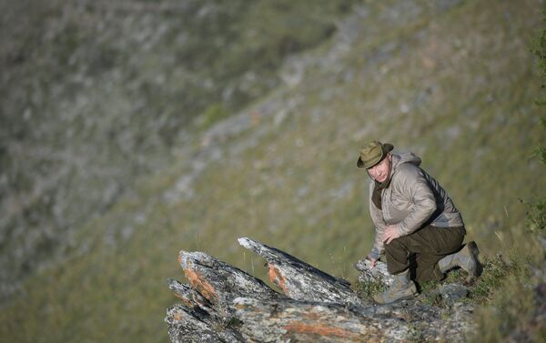 الرئيس الروسي فلاديمير بوتين خلال عطلته في جمهورية تيفا، روسيا 26 أغسطس/ آب 2018 - سبوتنيك عربي